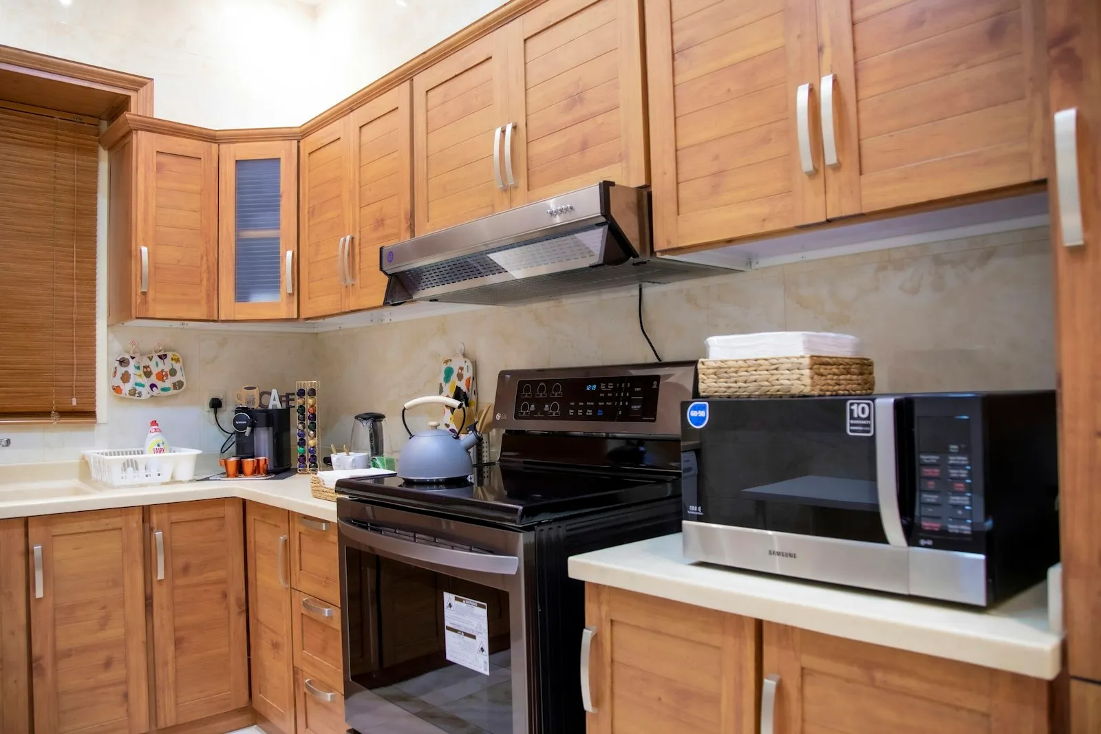 Dated kitchen with honey oak cabinets